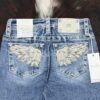 M9607BS Lt. Blue Miss Me Mid-Rise Boot Jean